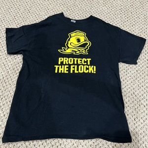 University of Oregon Ducks T-shirt “PROTECT THE FLOCK” size medium